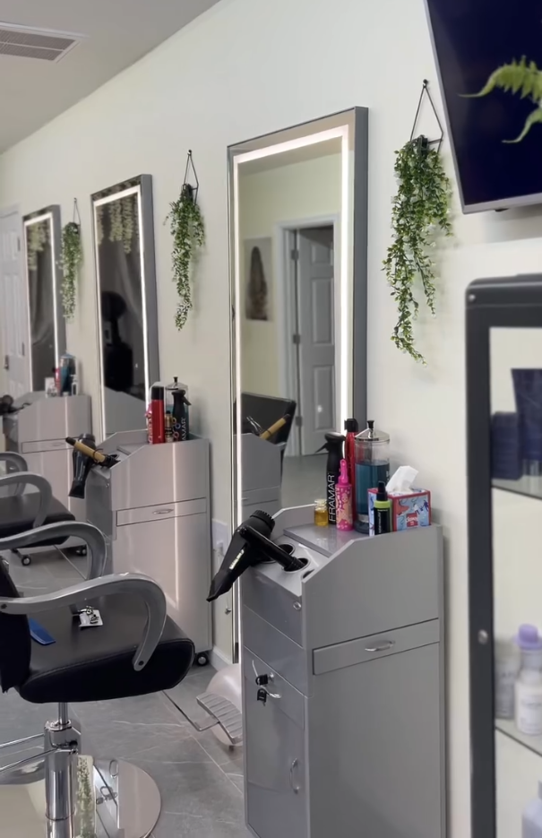 Stylist working with a client in a calm salon