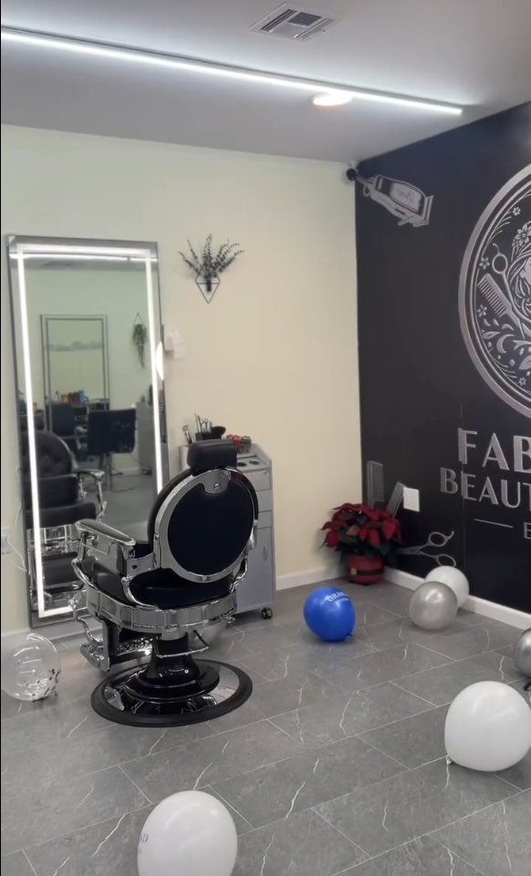 Stylist working with a client in a calm salon